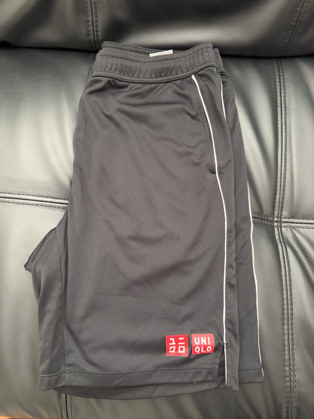 Uniqlo Black Shorts with White Side Piping and Red Logo - Federer